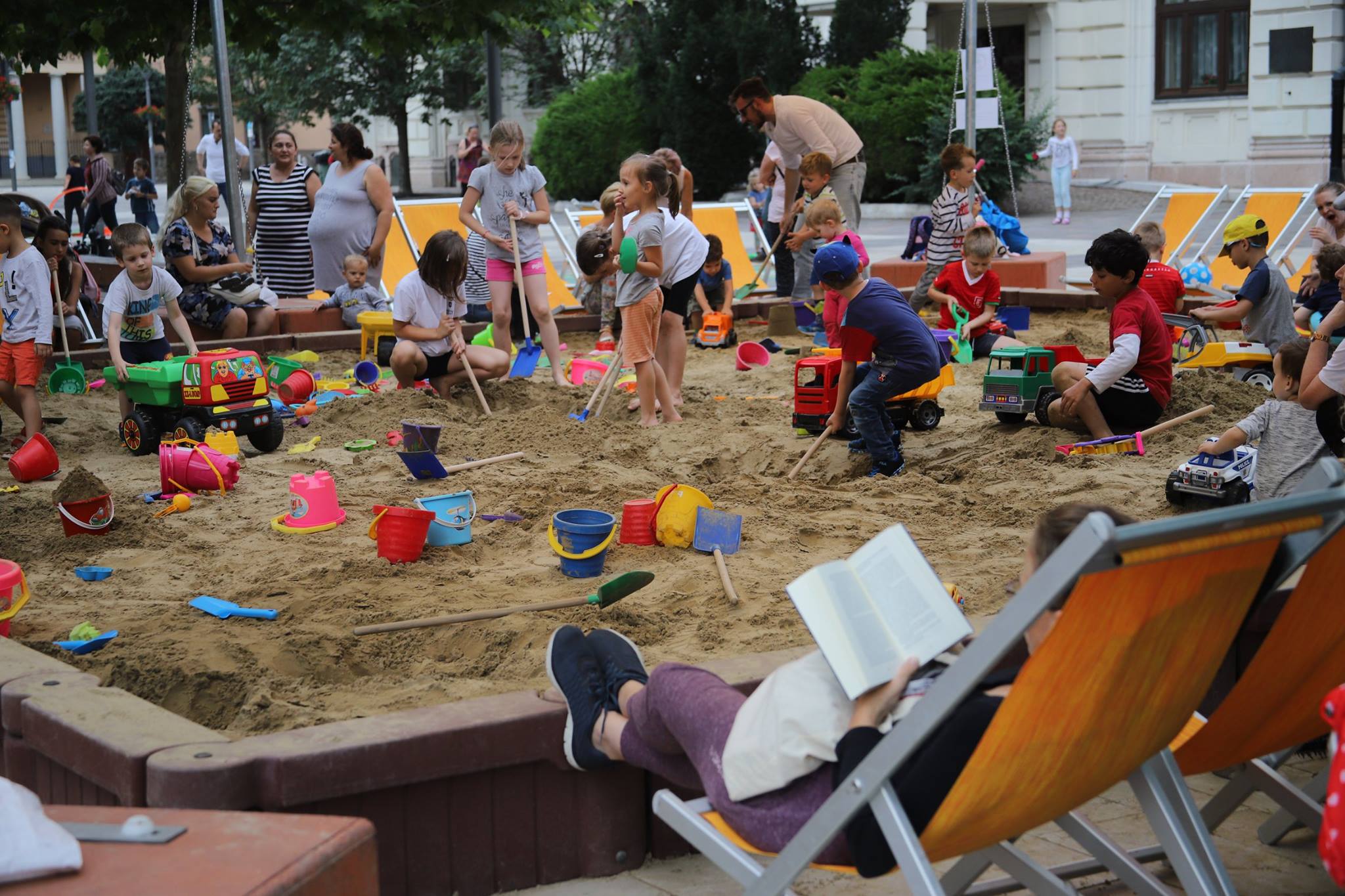 Kids playing in a giant sandbox