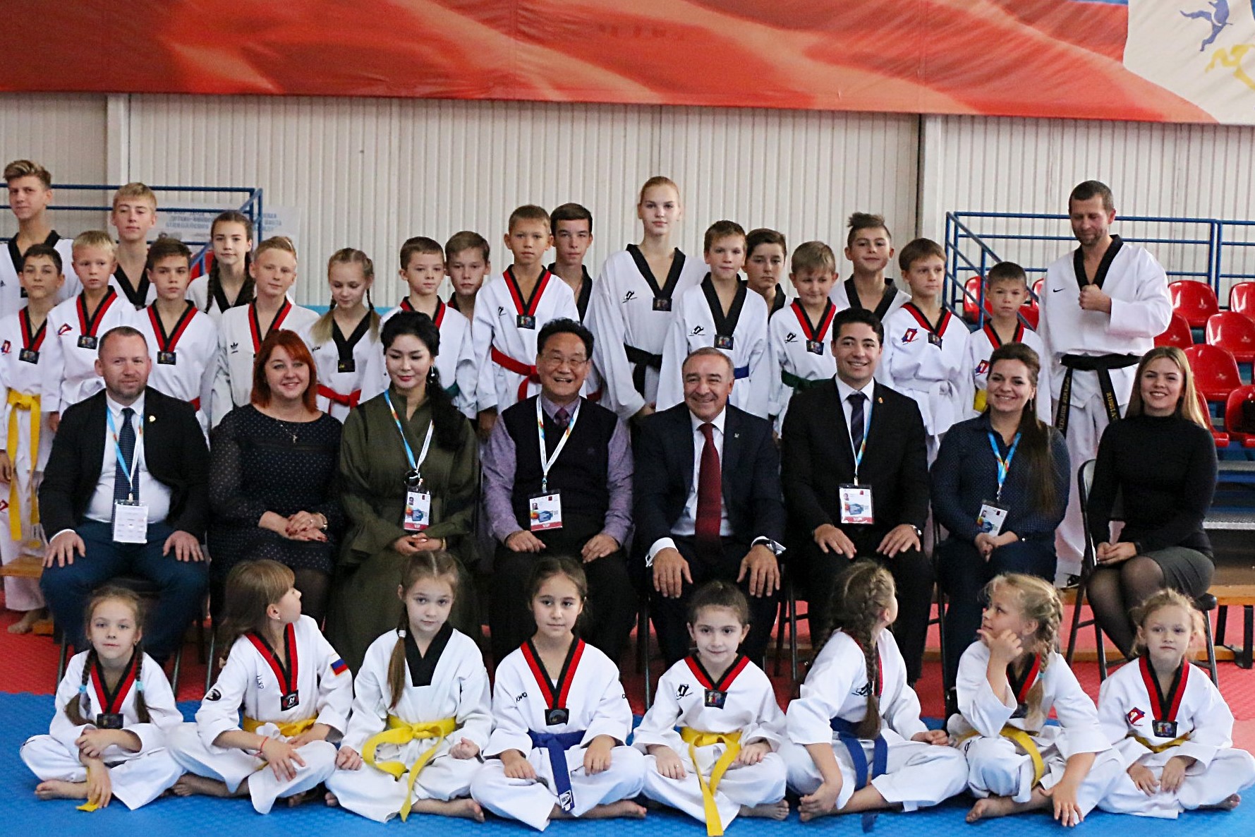 The TAFISA delegation with young Taekwondo students